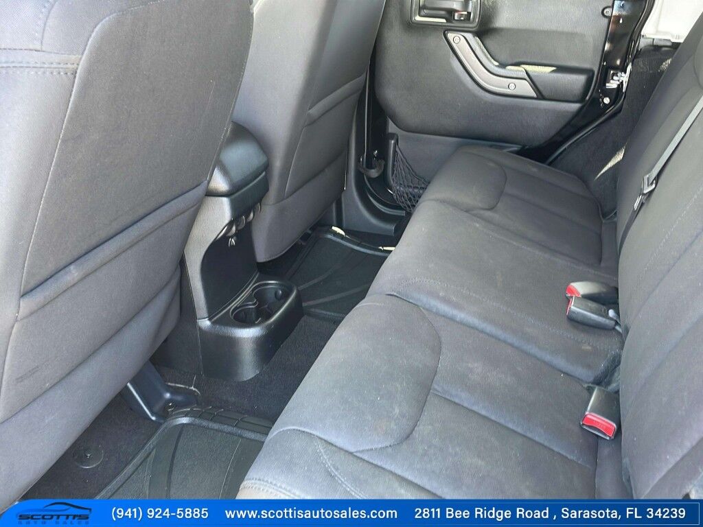2015 Jeep Wrangler Unlimited Freedom Edition~4X4~ANTI-THEFT SYSTEM~CRASH SENSORS~CRUISE CONTRO;~LIMITED SLIP DIFFERENTIAL~PREMIUM SOUND SYSTEM~REMOVABLE ROOF~RUNNING BOARDS~TOW HOOKS~TRAILER WIRING Sarasota FL