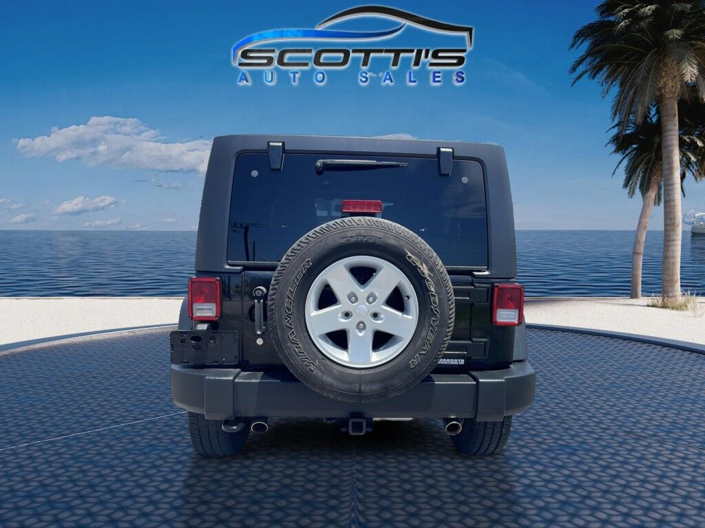 2015 Jeep Wrangler Unlimited Freedom Edition~4X4~ANTI-THEFT SYSTEM~CRASH SENSORS~CRUISE CONTRO;~LIMITED SLIP DIFFERENTIAL~PREMIUM SOUND SYSTEM~REMOVABLE ROOF~RUNNING BOARDS~TOW HOOKS~TRAILER WIRING Sarasota FL