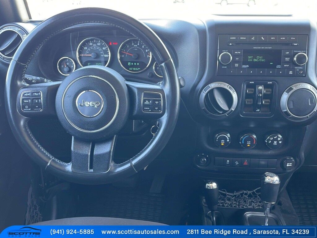2015 Jeep Wrangler Unlimited Freedom Edition~4X4~ANTI-THEFT SYSTEM~CRASH SENSORS~CRUISE CONTRO;~LIMITED SLIP DIFFERENTIAL~PREMIUM SOUND SYSTEM~REMOVABLE ROOF~RUNNING BOARDS~TOW HOOKS~TRAILER WIRING Sarasota FL