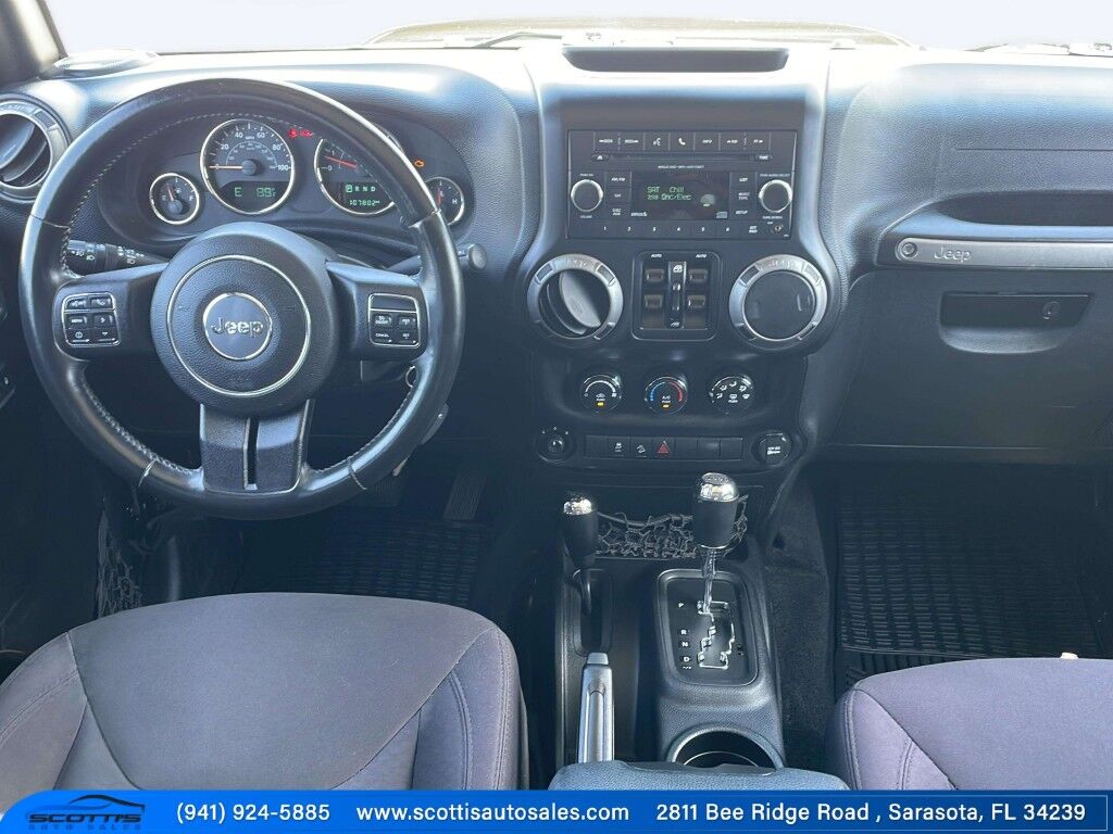 2015 Jeep Wrangler Unlimited Freedom Edition~4X4~ANTI-THEFT SYSTEM~CRASH SENSORS~CRUISE CONTRO;~LIMITED SLIP DIFFERENTIAL~PREMIUM SOUND SYSTEM~REMOVABLE ROOF~RUNNING BOARDS~TOW HOOKS~TRAILER WIRING Sarasota FL
