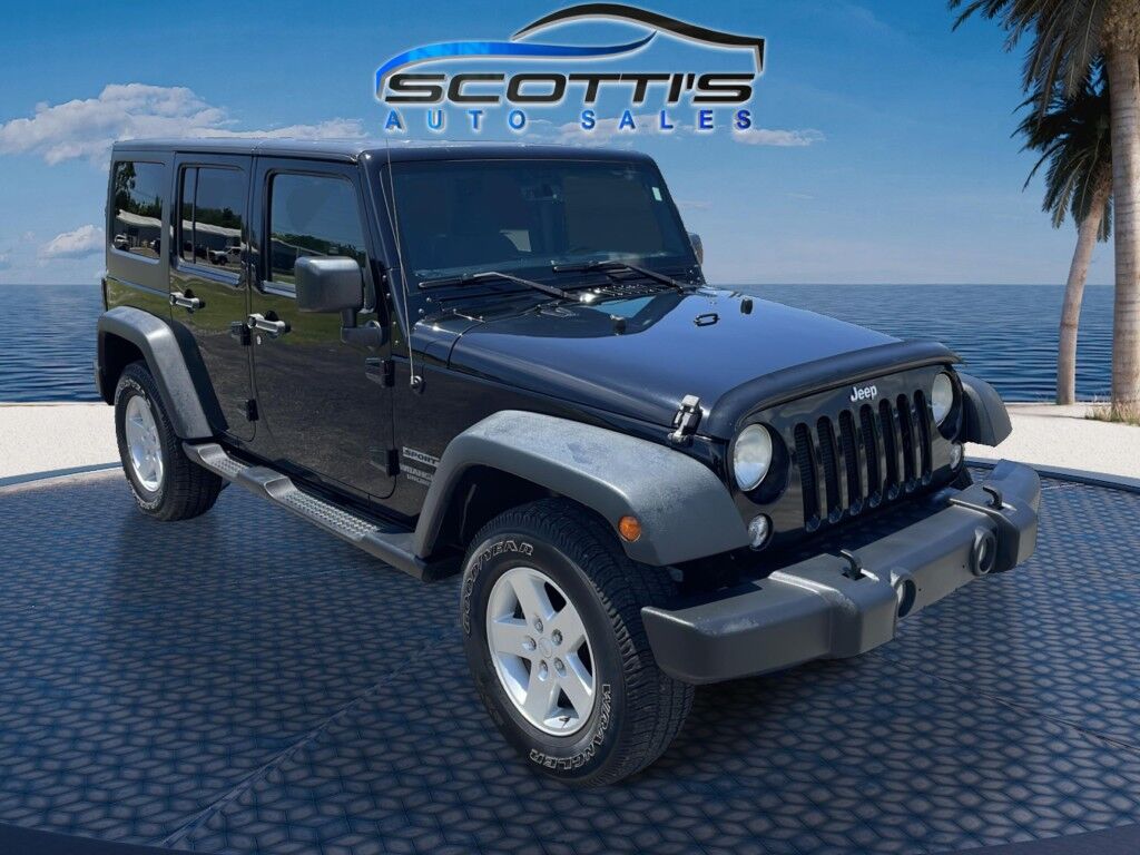 2015 Jeep Wrangler Unlimited Freedom Edition~4X4~ANTI-THEFT SYSTEM~CRASH SENSORS~CRUISE CONTRO;~LIMITED SLIP DIFFERENTIAL~PREMIUM SOUND SYSTEM~REMOVABLE ROOF~RUNNING BOARDS~TOW HOOKS~TRAILER WIRING Sarasota FL
