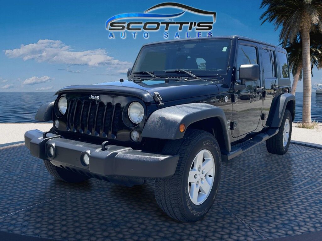2015 Jeep Wrangler Unlimited Freedom Edition~4X4~ANTI-THEFT SYSTEM~CRASH SENSORS~CRUISE CONTRO;~LIMITED SLIP DIFFERENTIAL~PREMIUM SOUND SYSTEM~REMOVABLE ROOF~RUNNING BOARDS~TOW HOOKS~TRAILER WIRING Sarasota FL