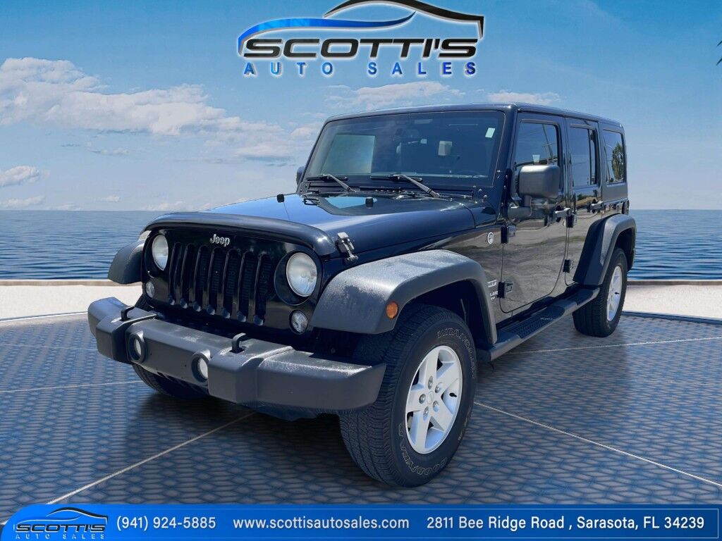 2015 Jeep Wrangler Unlimited Freedom Edition~4X4~ANTI-THEFT SYSTEM~CRASH SENSORS~CRUISE CONTRO;~LIMITED SLIP DIFFERENTIAL~PREMIUM SOUND SYSTEM~REMOVABLE ROOF~RUNNING BOARDS~TOW HOOKS~TRAILER WIRING Sarasota FL