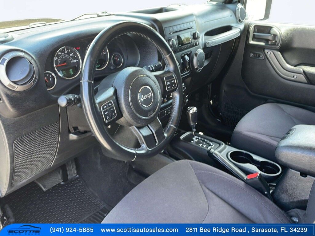 2015 Jeep Wrangler Unlimited Freedom Edition~4X4~ANTI-THEFT SYSTEM~CRASH SENSORS~CRUISE CONTRO;~LIMITED SLIP DIFFERENTIAL~PREMIUM SOUND SYSTEM~REMOVABLE ROOF~RUNNING BOARDS~TOW HOOKS~TRAILER WIRING Sarasota FL