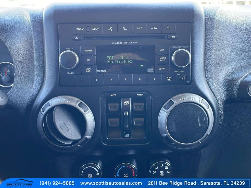 2015 Jeep Wrangler Unlimited Freedom Edition~4X4~ANTI-THEFT SYSTEM~CRASH SENSORS~CRUISE CONTRO;~LIMITED SLIP DIFFERENTIAL~PREMIUM SOUND SYSTEM~REMOVABLE ROOF~RUNNING BOARDS~TOW HOOKS~TRAILER WIRING Sarasota FL