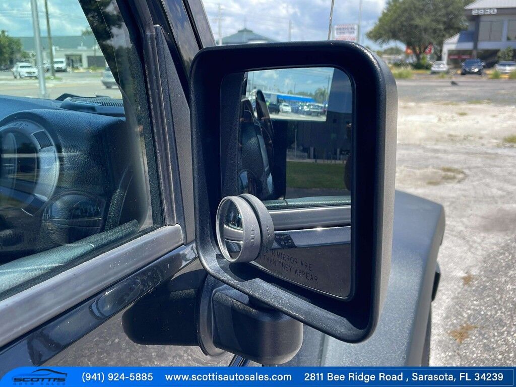 2015 Jeep Wrangler Unlimited Freedom Edition~4X4~ANTI-THEFT SYSTEM~CRASH SENSORS~CRUISE CONTRO;~LIMITED SLIP DIFFERENTIAL~PREMIUM SOUND SYSTEM~REMOVABLE ROOF~RUNNING BOARDS~TOW HOOKS~TRAILER WIRING Sarasota FL