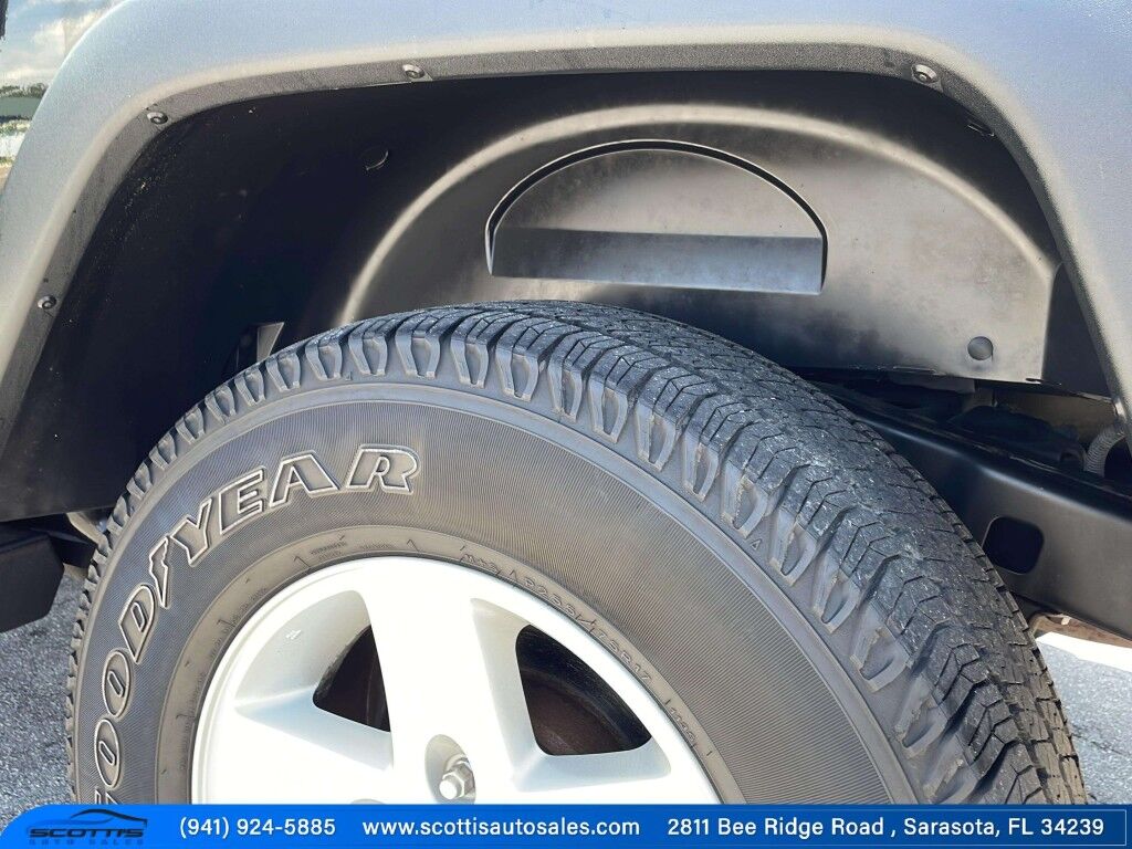 2015 Jeep Wrangler Unlimited Freedom Edition~4X4~ANTI-THEFT SYSTEM~CRASH SENSORS~CRUISE CONTRO;~LIMITED SLIP DIFFERENTIAL~PREMIUM SOUND SYSTEM~REMOVABLE ROOF~RUNNING BOARDS~TOW HOOKS~TRAILER WIRING Sarasota FL