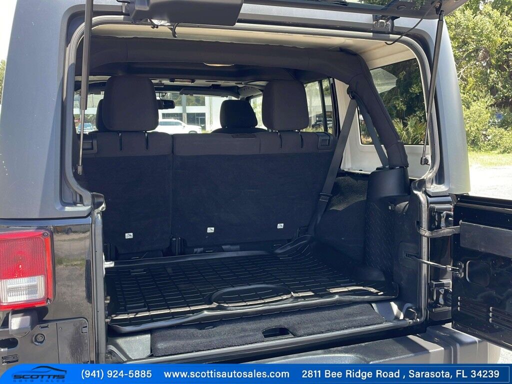 2015 Jeep Wrangler Unlimited Freedom Edition~4X4~ANTI-THEFT SYSTEM~CRASH SENSORS~CRUISE CONTRO;~LIMITED SLIP DIFFERENTIAL~PREMIUM SOUND SYSTEM~REMOVABLE ROOF~RUNNING BOARDS~TOW HOOKS~TRAILER WIRING Sarasota FL