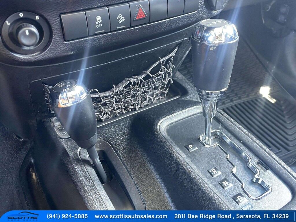 2015 Jeep Wrangler Unlimited Freedom Edition~4X4~ANTI-THEFT SYSTEM~CRASH SENSORS~CRUISE CONTRO;~LIMITED SLIP DIFFERENTIAL~PREMIUM SOUND SYSTEM~REMOVABLE ROOF~RUNNING BOARDS~TOW HOOKS~TRAILER WIRING Sarasota FL