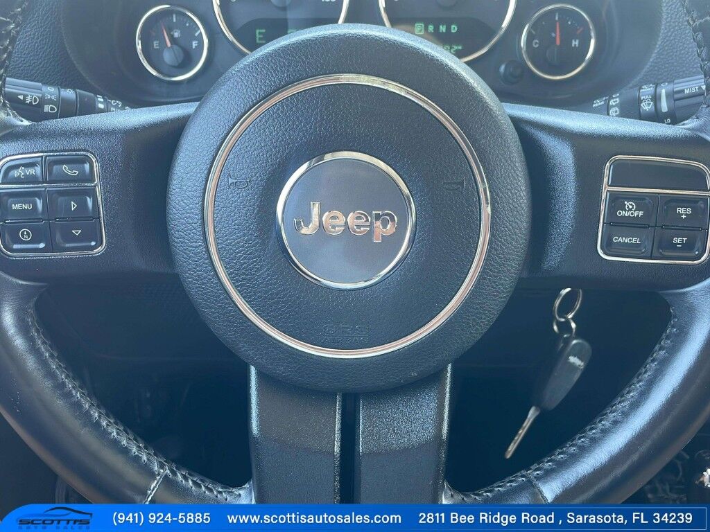 2015 Jeep Wrangler Unlimited Freedom Edition~4X4~ANTI-THEFT SYSTEM~CRASH SENSORS~CRUISE CONTRO;~LIMITED SLIP DIFFERENTIAL~PREMIUM SOUND SYSTEM~REMOVABLE ROOF~RUNNING BOARDS~TOW HOOKS~TRAILER WIRING Sarasota FL