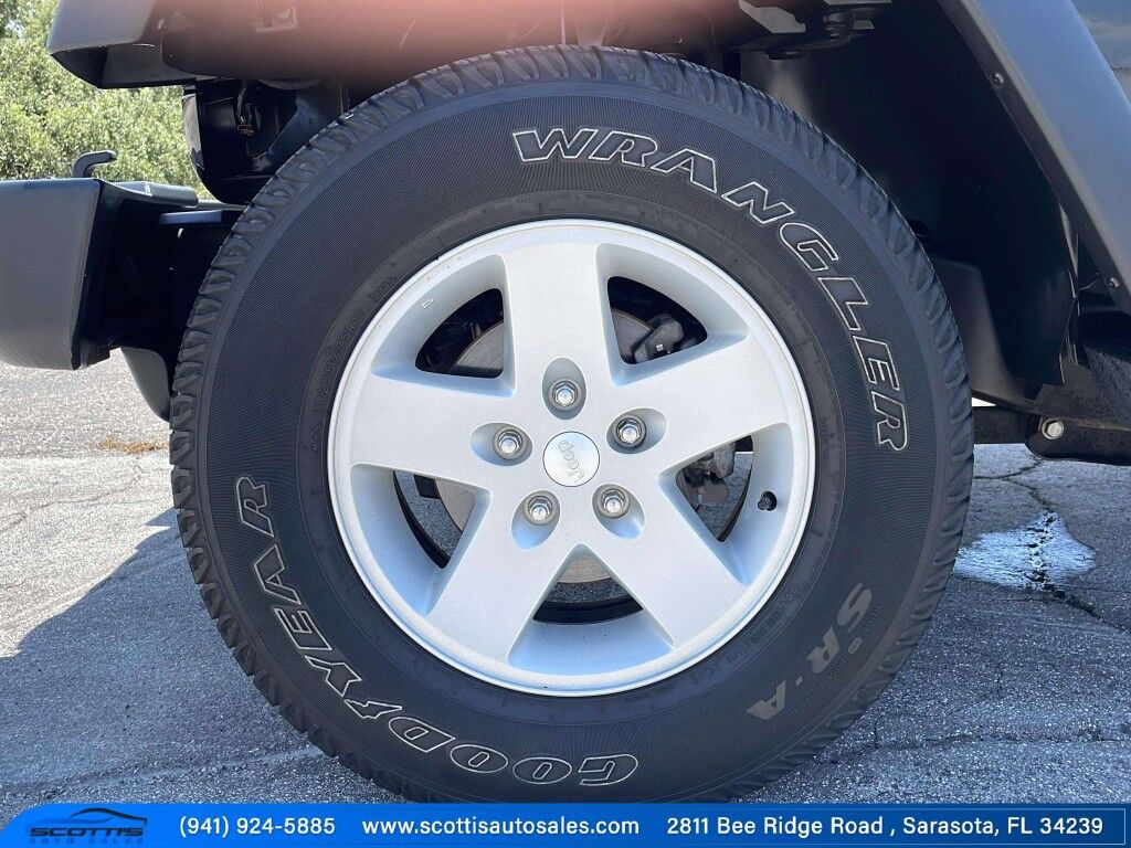 2015 Jeep Wrangler Unlimited Freedom Edition~4X4~ANTI-THEFT SYSTEM~CRASH SENSORS~CRUISE CONTRO;~LIMITED SLIP DIFFERENTIAL~PREMIUM SOUND SYSTEM~REMOVABLE ROOF~RUNNING BOARDS~TOW HOOKS~TRAILER WIRING Sarasota FL