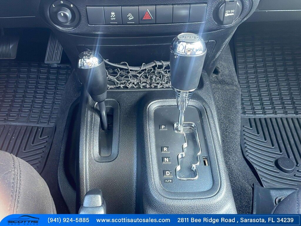 2015 Jeep Wrangler Unlimited Freedom Edition~4X4~ANTI-THEFT SYSTEM~CRASH SENSORS~CRUISE CONTRO;~LIMITED SLIP DIFFERENTIAL~PREMIUM SOUND SYSTEM~REMOVABLE ROOF~RUNNING BOARDS~TOW HOOKS~TRAILER WIRING Sarasota FL