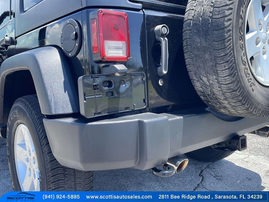 2015 Jeep Wrangler Unlimited Freedom Edition~4X4~ANTI-THEFT SYSTEM~CRASH SENSORS~CRUISE CONTRO;~LIMITED SLIP DIFFERENTIAL~PREMIUM SOUND SYSTEM~REMOVABLE ROOF~RUNNING BOARDS~TOW HOOKS~TRAILER WIRING Sarasota FL