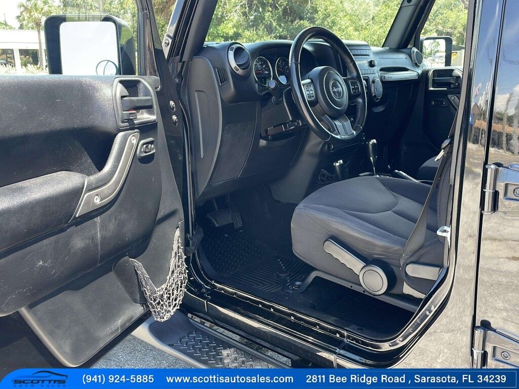 2015 Jeep Wrangler Unlimited Freedom Edition~4X4~ANTI-THEFT SYSTEM~CRASH SENSORS~CRUISE CONTRO;~LIMITED SLIP DIFFERENTIAL~PREMIUM SOUND SYSTEM~REMOVABLE ROOF~RUNNING BOARDS~TOW HOOKS~TRAILER WIRING Sarasota FL