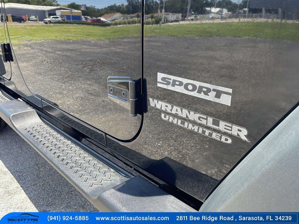 2015 Jeep Wrangler Unlimited Freedom Edition~4X4~ANTI-THEFT SYSTEM~CRASH SENSORS~CRUISE CONTRO;~LIMITED SLIP DIFFERENTIAL~PREMIUM SOUND SYSTEM~REMOVABLE ROOF~RUNNING BOARDS~TOW HOOKS~TRAILER WIRING Sarasota FL