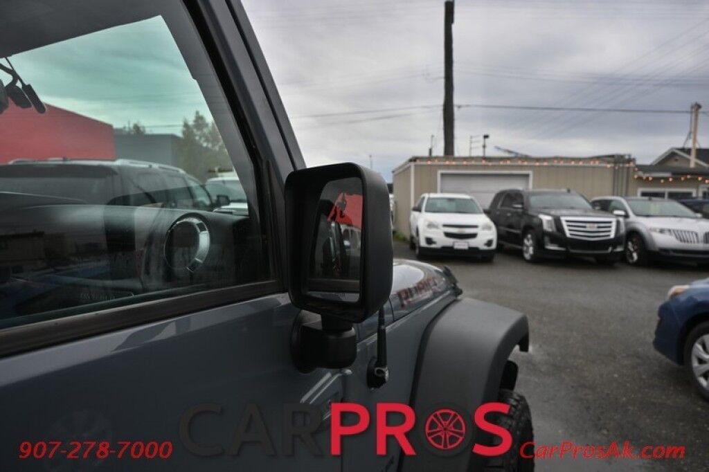 2015 Jeep Wrangler Unlimited Rubicon Hard Rock - 4X4 - 6 Speed Manual - Hard Top - Heated Leather Seats - Power Locks, Windows & Mirrors - Bluetooth - Navigation - Alpine Speakers - Winch - Keyless Entry - Aluminum Wheels Anchorage AK