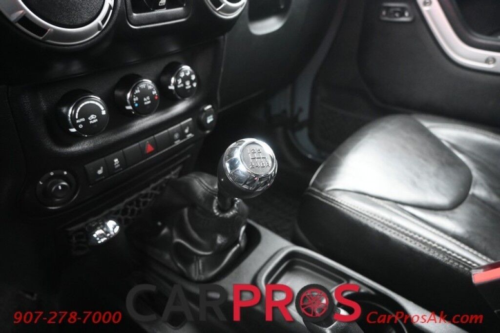 2015 Jeep Wrangler Unlimited Rubicon Hard Rock - 4X4 - 6 Speed Manual - Hard Top - Heated Leather Seats - Power Locks, Windows & Mirrors - Bluetooth - Navigation - Alpine Speakers - Winch - Keyless Entry - Aluminum Wheels Anchorage AK