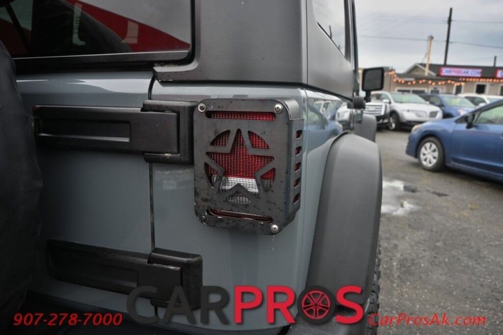 2015 Jeep Wrangler Unlimited Rubicon Hard Rock - 4X4 - 6 Speed Manual - Hard Top - Heated Leather Seats - Power Locks, Windows & Mirrors - Bluetooth - Navigation - Alpine Speakers - Winch - Keyless Entry - Aluminum Wheels Anchorage AK