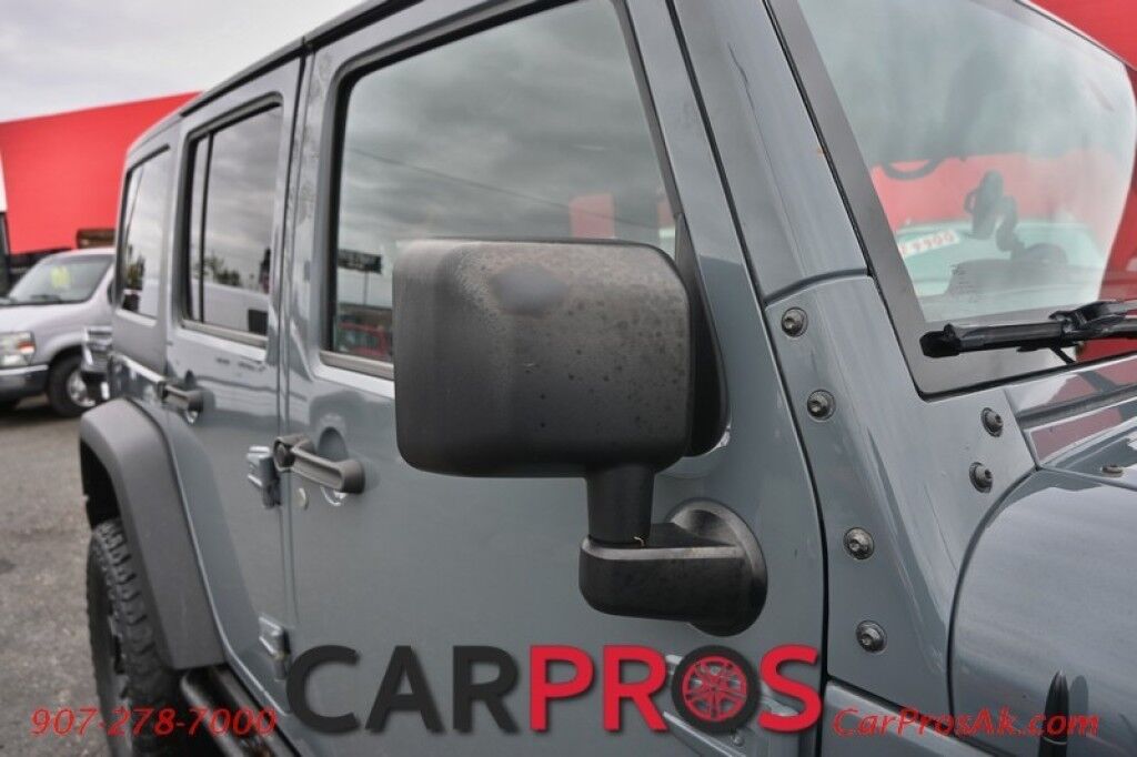 2015 Jeep Wrangler Unlimited Rubicon Hard Rock - 4X4 - 6 Speed Manual - Hard Top - Heated Leather Seats - Power Locks, Windows & Mirrors - Bluetooth - Navigation - Alpine Speakers - Winch - Keyless Entry - Aluminum Wheels Anchorage AK