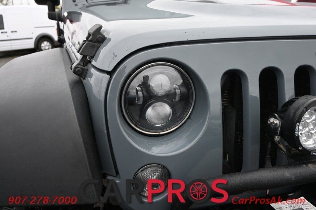 2015 Jeep Wrangler Unlimited Rubicon Hard Rock - 4X4 - 6 Speed Manual - Hard Top - Heated Leather Seats - Power Locks, Windows & Mirrors - Bluetooth - Navigation - Alpine Speakers - Winch - Keyless Entry - Aluminum Wheels Anchorage AK