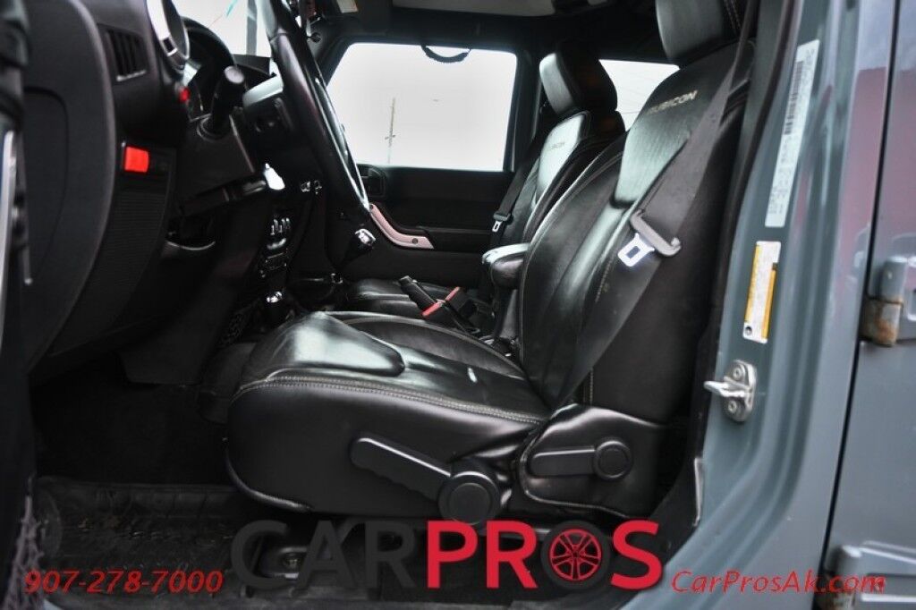 2015 Jeep Wrangler Unlimited Rubicon Hard Rock - 4X4 - 6 Speed Manual - Hard Top - Heated Leather Seats - Power Locks, Windows & Mirrors - Bluetooth - Navigation - Alpine Speakers - Winch - Keyless Entry - Aluminum Wheels Anchorage AK
