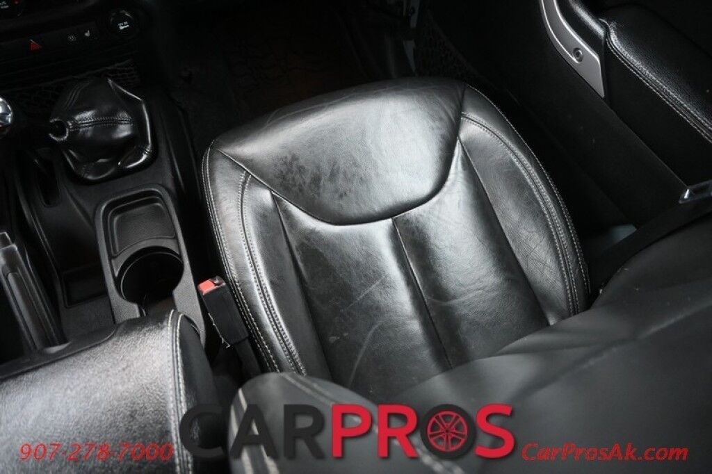 2015 Jeep Wrangler Unlimited Rubicon Hard Rock - 4X4 - 6 Speed Manual - Hard Top - Heated Leather Seats - Power Locks, Windows & Mirrors - Bluetooth - Navigation - Alpine Speakers - Winch - Keyless Entry - Aluminum Wheels Anchorage AK