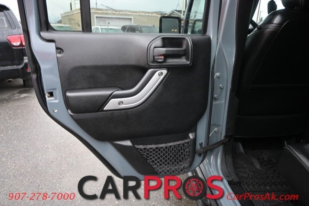 2015 Jeep Wrangler Unlimited Rubicon Hard Rock - 4X4 - 6 Speed Manual - Hard Top - Heated Leather Seats - Power Locks, Windows & Mirrors - Bluetooth - Navigation - Alpine Speakers - Winch - Keyless Entry - Aluminum Wheels Anchorage AK