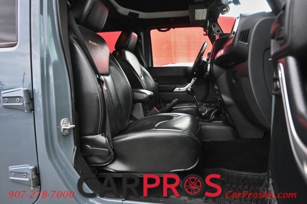 2015 Jeep Wrangler Unlimited Rubicon Hard Rock - 4X4 - 6 Speed Manual - Hard Top - Heated Leather Seats - Power Locks, Windows & Mirrors - Bluetooth - Navigation - Alpine Speakers - Winch - Keyless Entry - Aluminum Wheels Anchorage AK