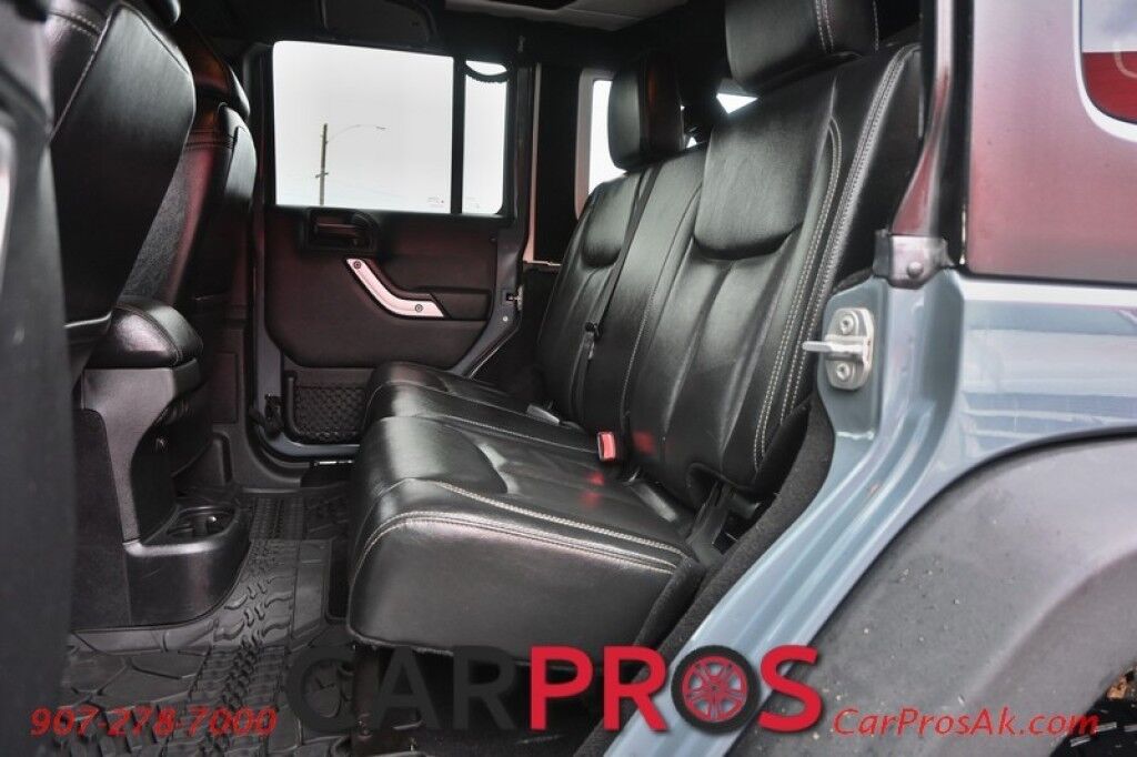 2015 Jeep Wrangler Unlimited Rubicon Hard Rock - 4X4 - 6 Speed Manual - Hard Top - Heated Leather Seats - Power Locks, Windows & Mirrors - Bluetooth - Navigation - Alpine Speakers - Winch - Keyless Entry - Aluminum Wheels Anchorage AK