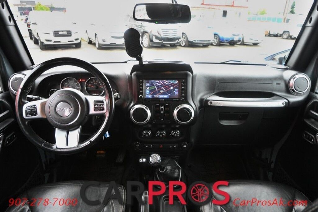 2015 Jeep Wrangler Unlimited Rubicon Hard Rock - 4X4 - 6 Speed Manual - Hard Top - Heated Leather Seats - Power Locks, Windows & Mirrors - Bluetooth - Navigation - Alpine Speakers - Winch - Keyless Entry - Aluminum Wheels Anchorage AK