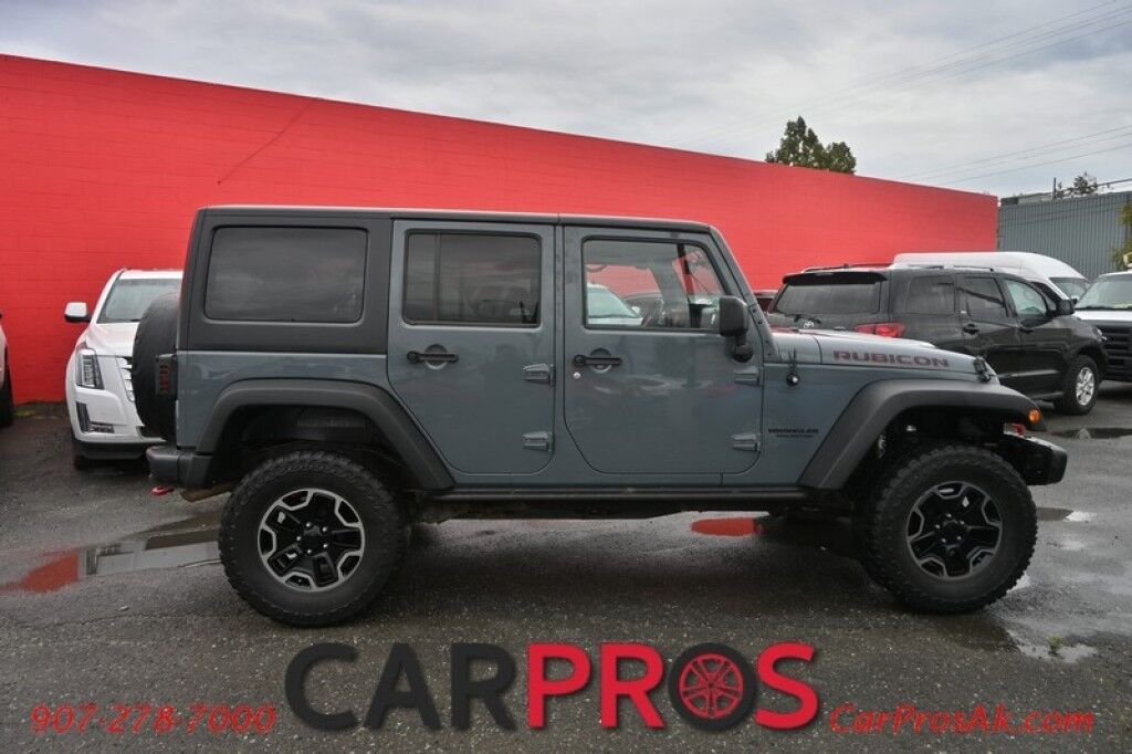 2015 Jeep Wrangler Unlimited Rubicon Hard Rock - 4X4 - 6 Speed Manual - Hard Top - Heated Leather Seats - Power Locks, Windows & Mirrors - Bluetooth - Navigation - Alpine Speakers - Winch - Keyless Entry - Aluminum Wheels Anchorage AK