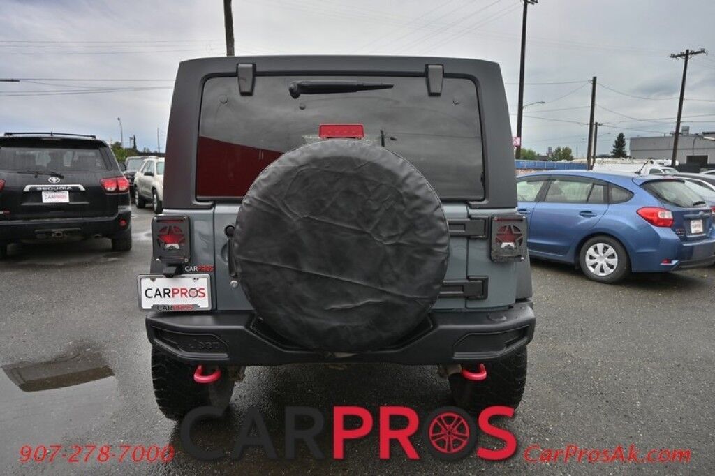 2015 Jeep Wrangler Unlimited Rubicon Hard Rock - 4X4 - 6 Speed Manual - Hard Top - Heated Leather Seats - Power Locks, Windows & Mirrors - Bluetooth - Navigation - Alpine Speakers - Winch - Keyless Entry - Aluminum Wheels Anchorage AK