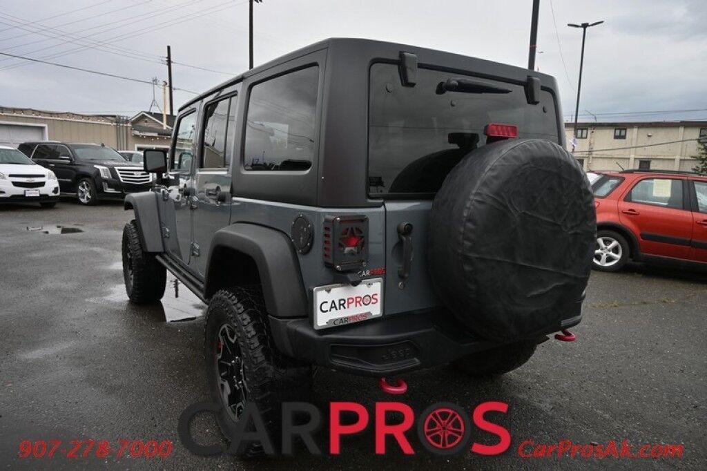 2015 Jeep Wrangler Unlimited Rubicon Hard Rock - 4X4 - 6 Speed Manual - Hard Top - Heated Leather Seats - Power Locks, Windows & Mirrors - Bluetooth - Navigation - Alpine Speakers - Winch - Keyless Entry - Aluminum Wheels Anchorage AK