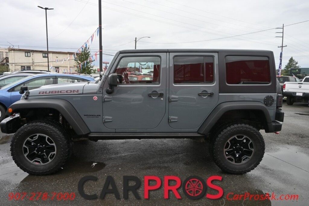 2015 Jeep Wrangler Unlimited Rubicon Hard Rock - 4X4 - 6 Speed Manual - Hard Top - Heated Leather Seats - Power Locks, Windows & Mirrors - Bluetooth - Navigation - Alpine Speakers - Winch - Keyless Entry - Aluminum Wheels Anchorage AK
