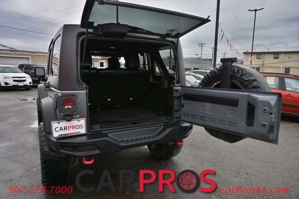 2015 Jeep Wrangler Unlimited Rubicon Hard Rock - 4X4 - 6 Speed Manual - Hard Top - Heated Leather Seats - Power Locks, Windows & Mirrors - Bluetooth - Navigation - Alpine Speakers - Winch - Keyless Entry - Aluminum Wheels Anchorage AK