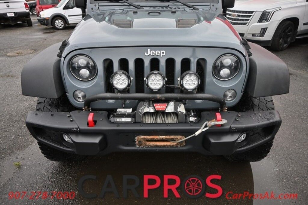 2015 Jeep Wrangler Unlimited Rubicon Hard Rock - 4X4 - 6 Speed Manual - Hard Top - Heated Leather Seats - Power Locks, Windows & Mirrors - Bluetooth - Navigation - Alpine Speakers - Winch - Keyless Entry - Aluminum Wheels Anchorage AK