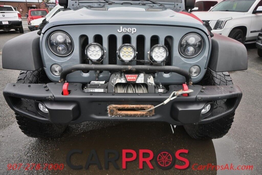 2015 Jeep Wrangler Unlimited Rubicon Hard Rock - 4X4 - 6 Speed Manual - Hard Top - Heated Leather Seats - Power Locks, Windows & Mirrors - Bluetooth - Navigation - Alpine Speakers - Winch - Keyless Entry - Aluminum Wheels Anchorage AK