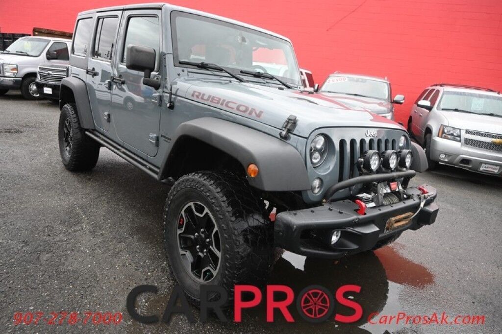 2015 Jeep Wrangler Unlimited Rubicon Hard Rock - 4X4 - 6 Speed Manual - Hard Top - Heated Leather Seats - Power Locks, Windows & Mirrors - Bluetooth - Navigation - Alpine Speakers - Winch - Keyless Entry - Aluminum Wheels Anchorage AK