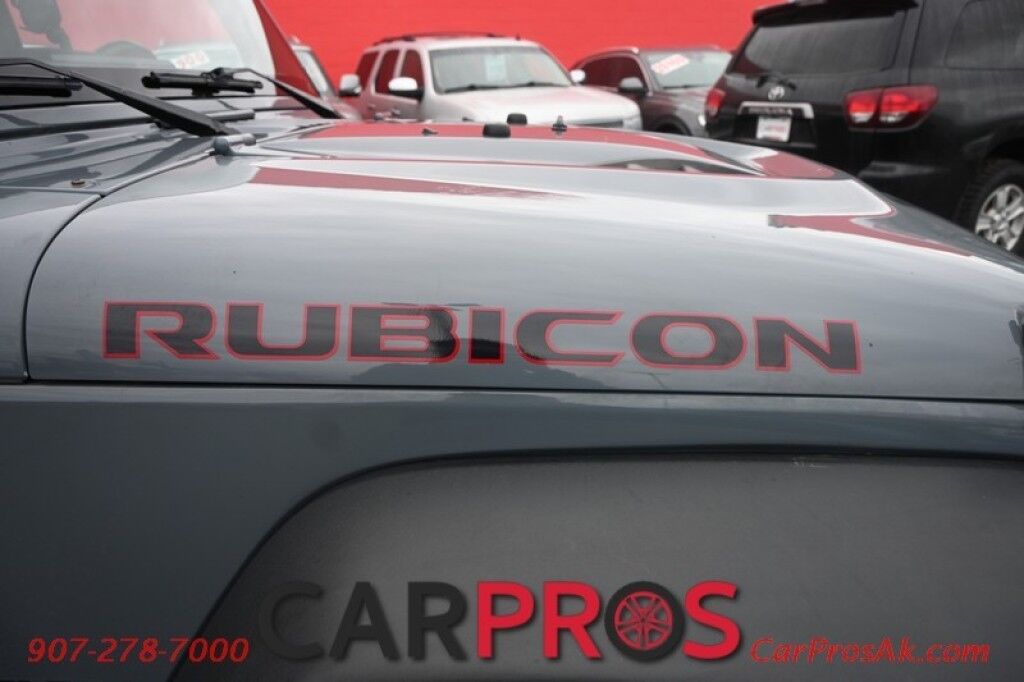 2015 Jeep Wrangler Unlimited Rubicon Hard Rock - 4X4 - 6 Speed Manual - Hard Top - Heated Leather Seats - Power Locks, Windows & Mirrors - Bluetooth - Navigation - Alpine Speakers - Winch - Keyless Entry - Aluminum Wheels Anchorage AK