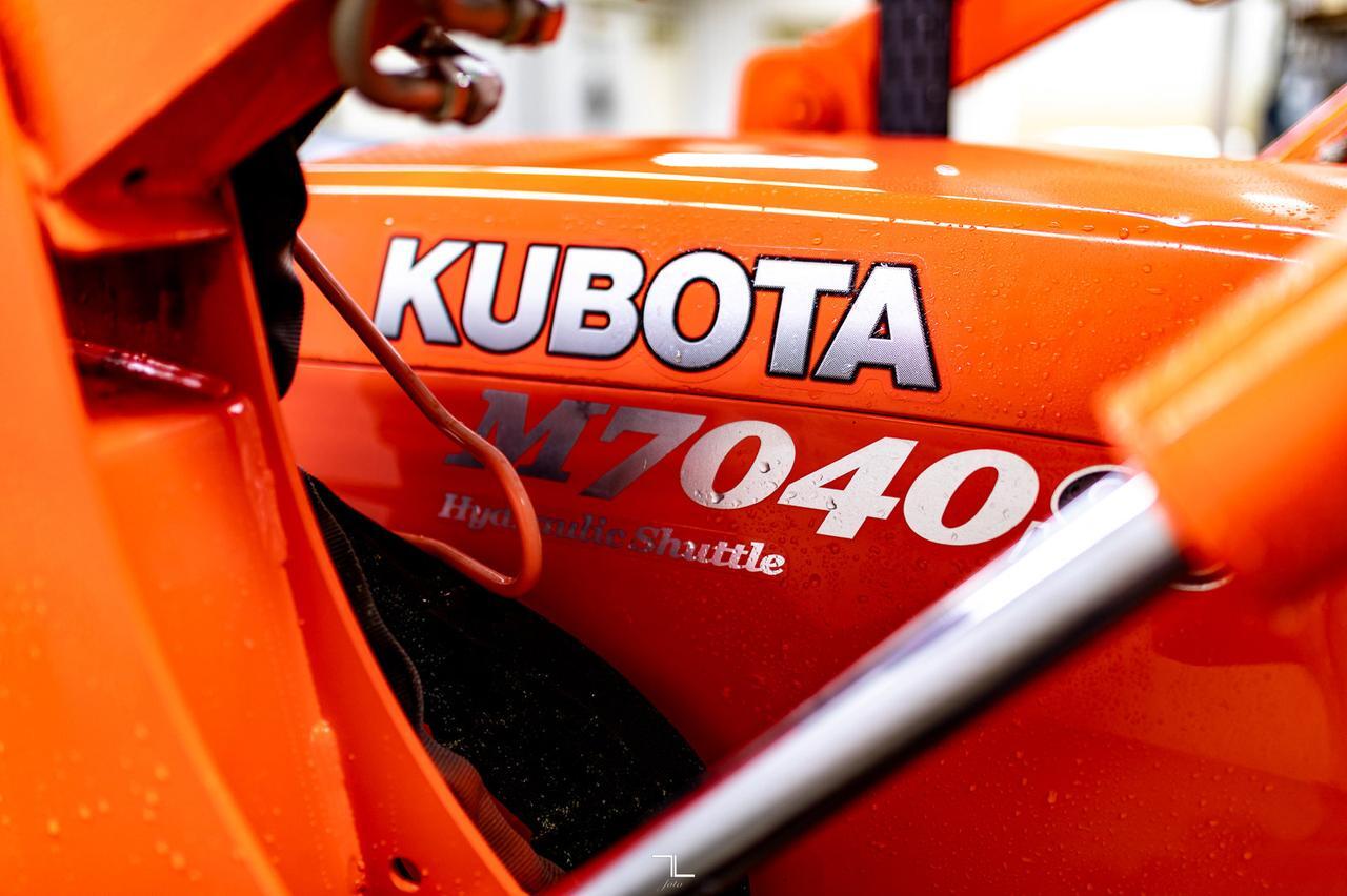 2015 Kubota M7040SUD 4WD Tractor Loader Grapple Diesel Red Deer AB