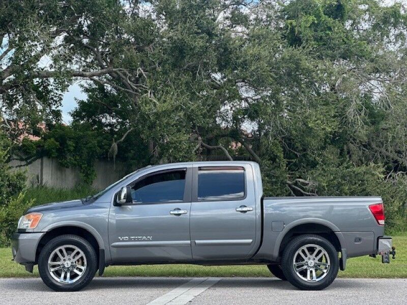 2015 Nissan TITAN SL 4X4 LEATHER SUNROOF NAVIGATION EXHAUST CREW CAB BRAND NEW TIRES SERVICED FREE SHIPPING IN FLORIDA LOW MILES TRUCK Sarasota FL