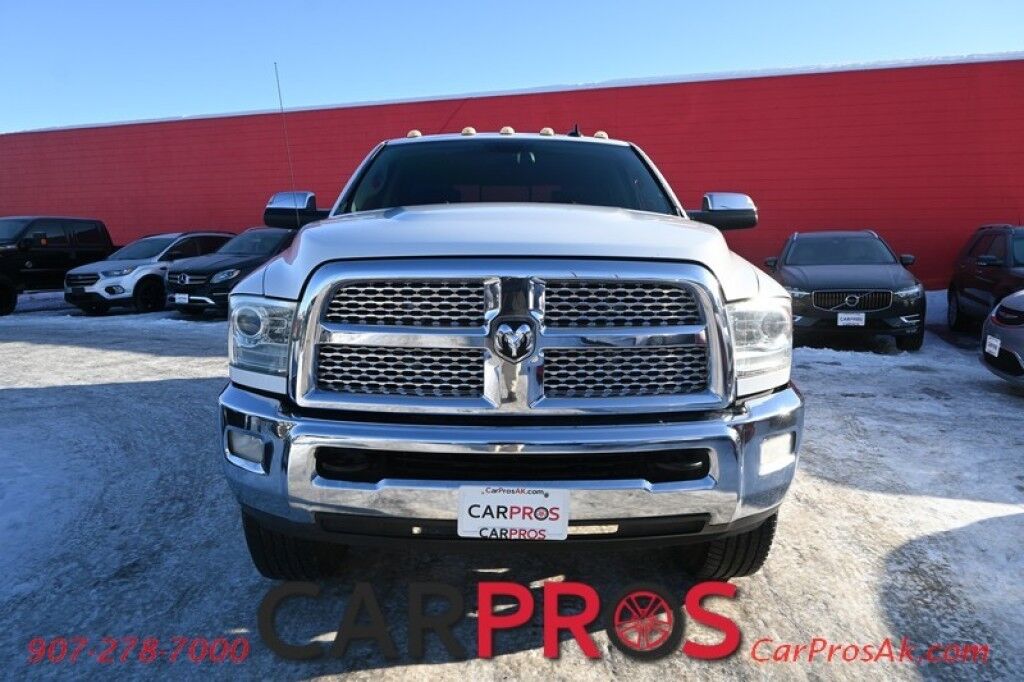 2015 Ram 3500 Laramie - 4X4 - 6.4L V8 - Crew Cab - Front Heated & Cooled Leather Seats - Heated Steering Wheel - 2nd Row Heated Seats - Remote Start - Navigation - Sunroof - Bluetooth - Backup Camera - Ram Storage Box - Bedliner - Tow Pkg