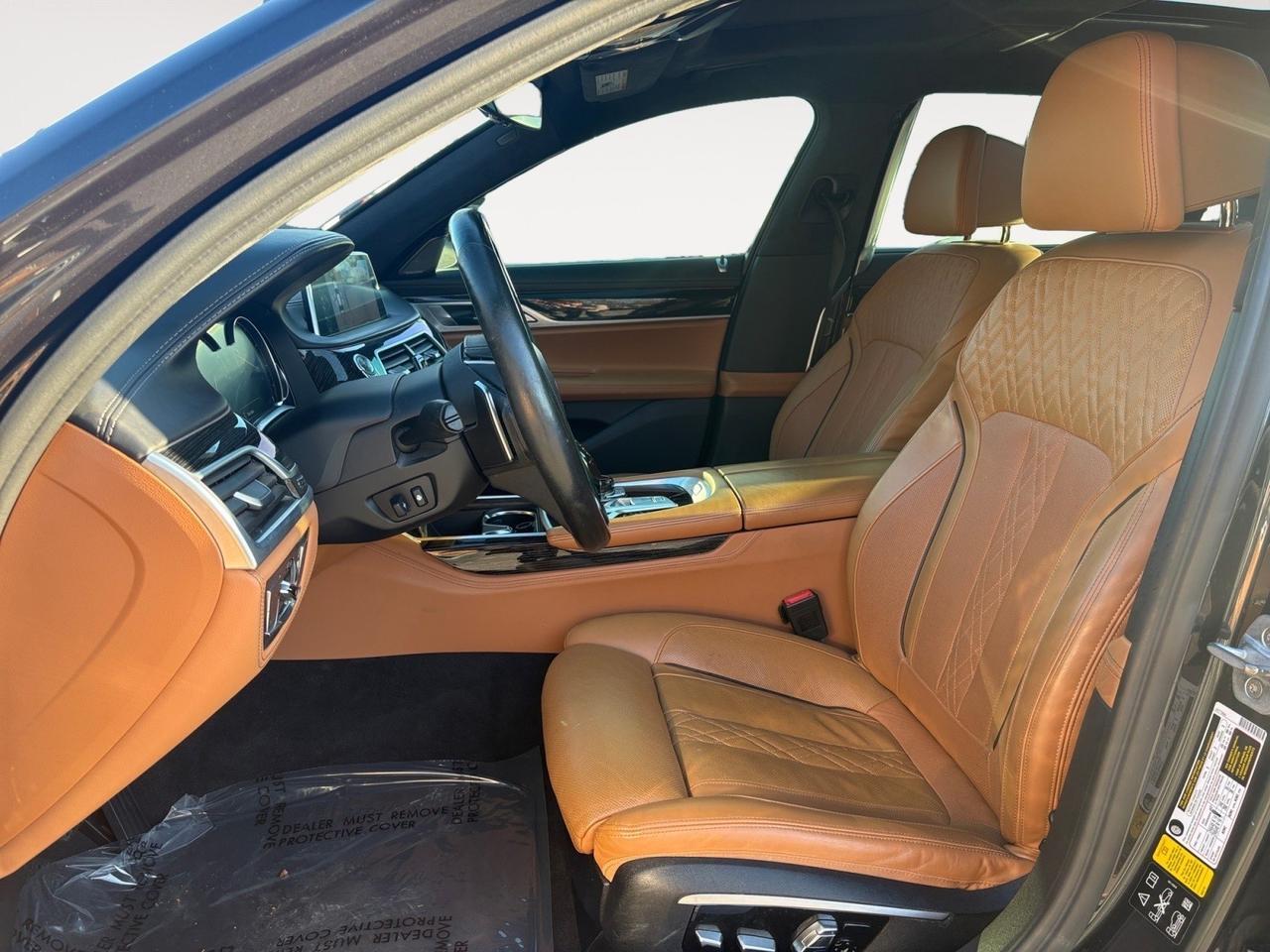 2016 BMW 7 Series 750i xDrive, BLIND SPOT ALERT, LANE KEEP ASSIST, STEERING WHEEL ASSIST, TWIN PANEL MOONROOF, 360 BACKUP CAMERA, MASSAGING SEATS, HEATED & VENTILATED SEATS, PADDLE SHIFTERS, NAVIGATION, SPORT/ECO MODE, ONLY 34K MILES, RIDE IN STYLE!