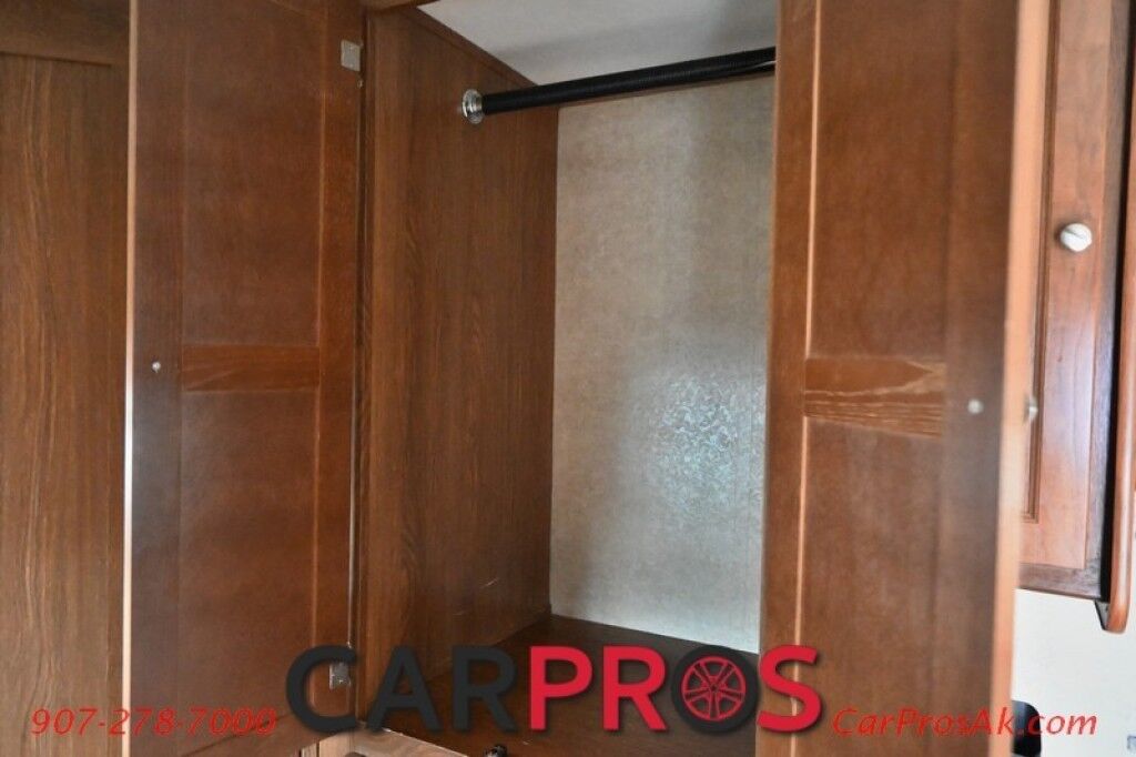 2016 Ford 230CB LEPRECHAUN - 6.8L V10 Triton - 4.0 kW Onan Generator - 3 Burner Stove - Microwave - Refridgerator - Sleeps 7 - Power Awning - Bathroom w/ Shower - Queen Bed - Tow Package Anchorage AK