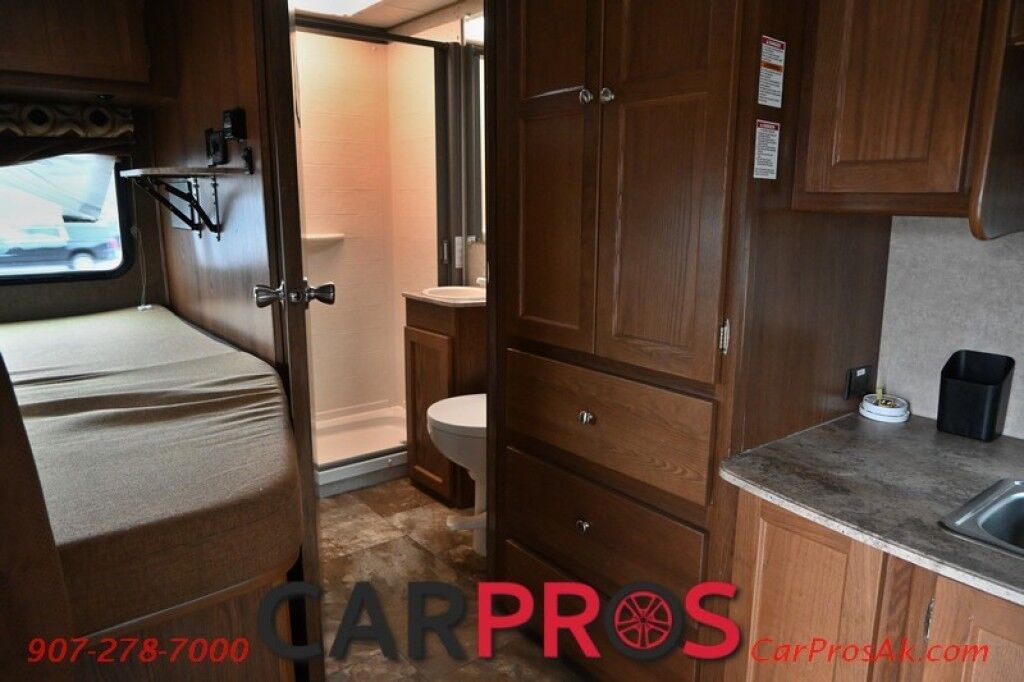 2016 Ford 230CB LEPRECHAUN - 6.8L V10 Triton - 4.0 kW Onan Generator - 3 Burner Stove - Microwave - Refridgerator - Sleeps 7 - Power Awning - Bathroom w/ Shower - Queen Bed - Tow Package Anchorage AK