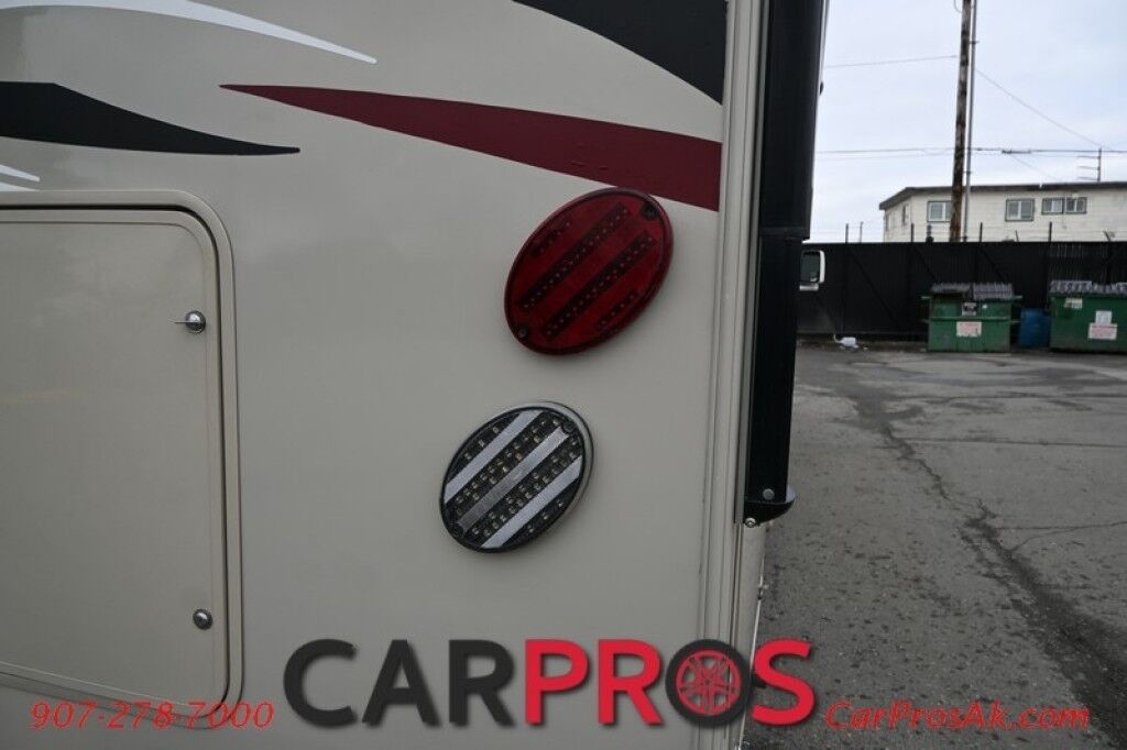 2016 Ford 230CB LEPRECHAUN - 6.8L V10 Triton - 4.0 kW Onan Generator - 3 Burner Stove - Microwave - Refridgerator - Sleeps 7 - Power Awning - Bathroom w/ Shower - Queen Bed - Tow Package Anchorage AK