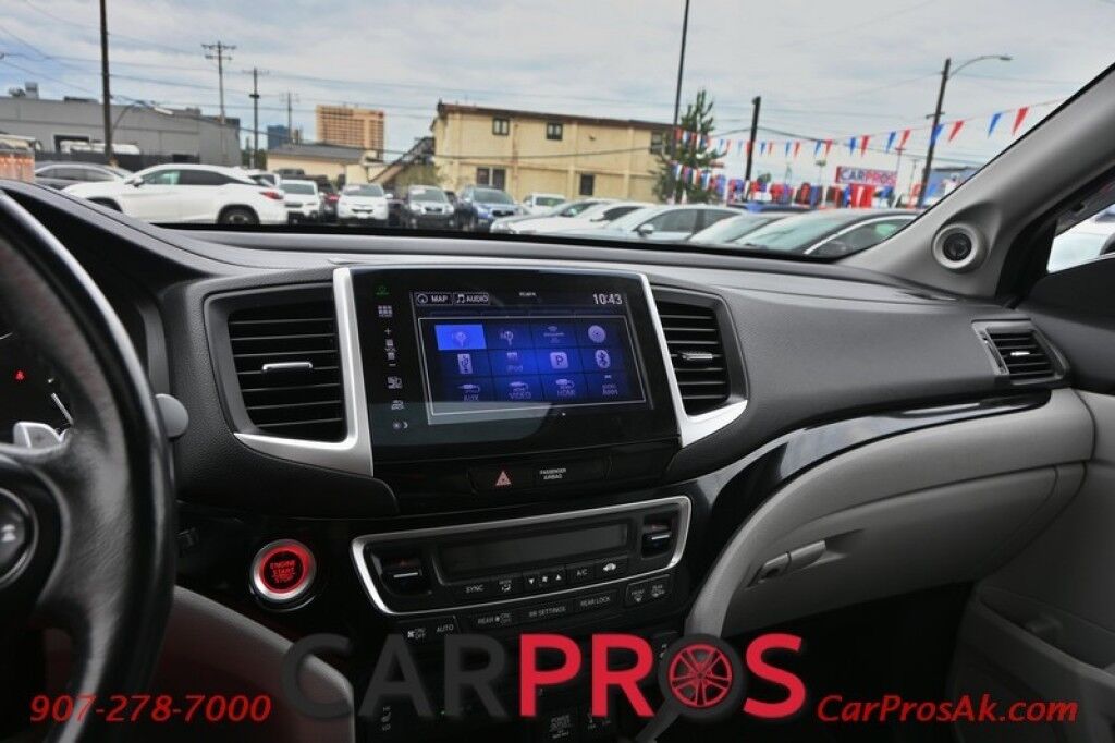 2016 Honda Pilot Touring - AWD - AutoStart - Power & Heated Leather Seats - Sunroof - Navigation - Sunroof - Lane Departure & Adaptive Cruise - Rear Entertainment - Back up Camera - Power Liftgate - 3rd Row - Seats 8 - Keyless Entry & Start - 26 MPG Anchorage AK