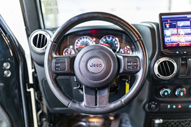 2016 Jeep Wrangler 4x4 Sahara Red Deer AB