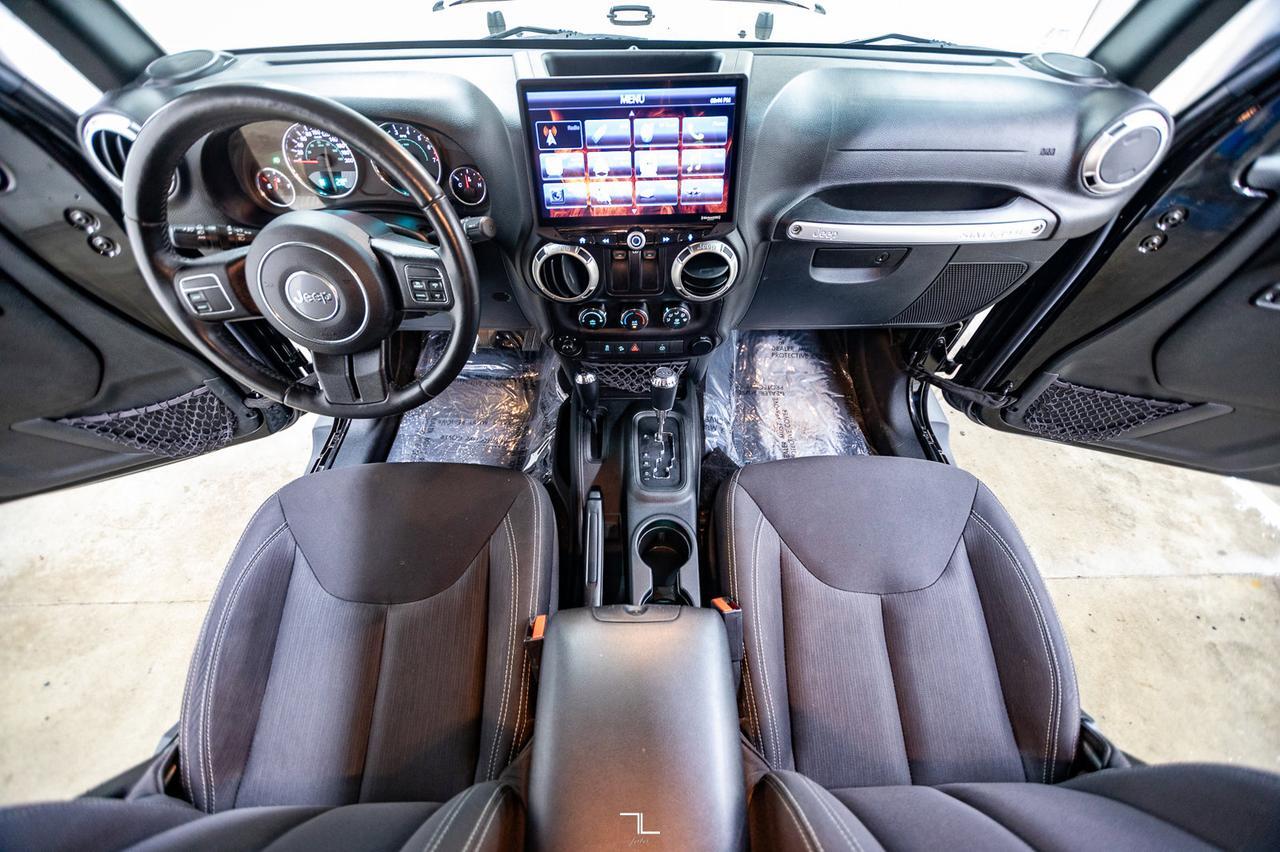 2016 Jeep Wrangler 4x4 Sahara Red Deer AB