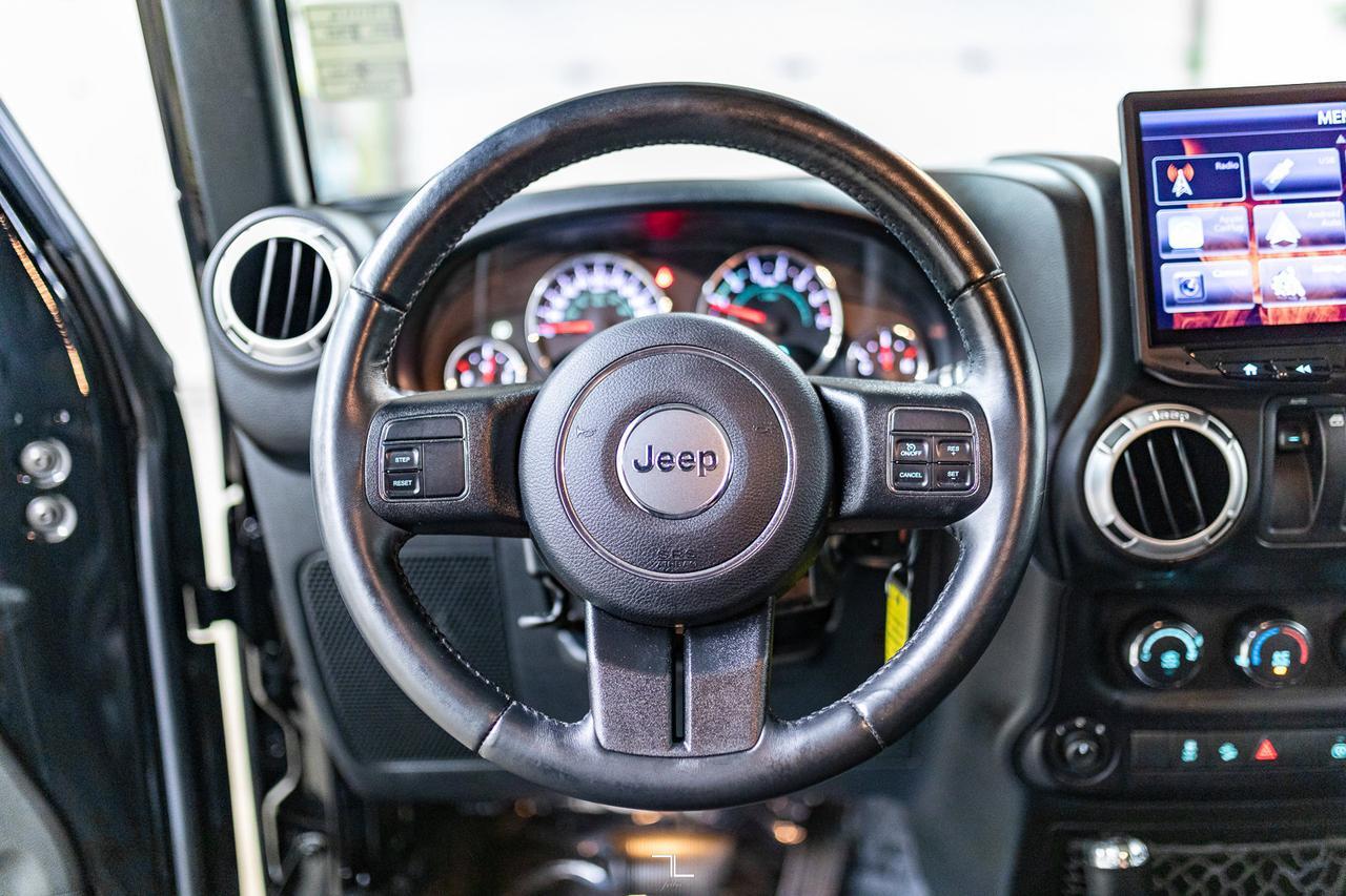 2016 Jeep Wrangler 4x4 Sahara Red Deer AB